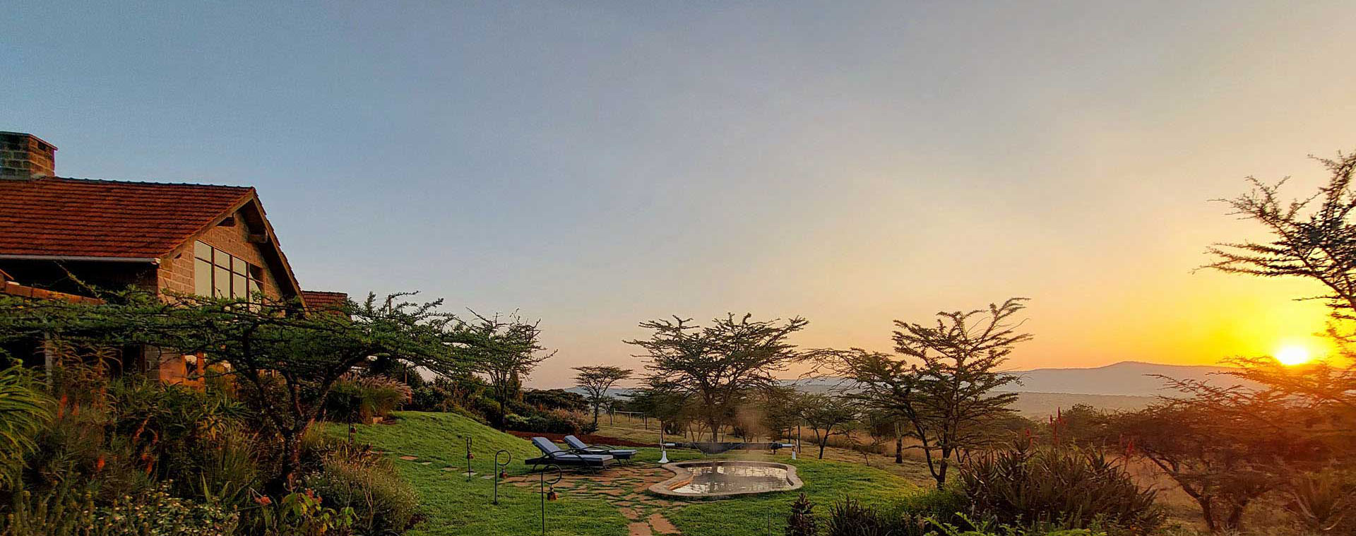 Safari vehicle with Kilimanjaro in background